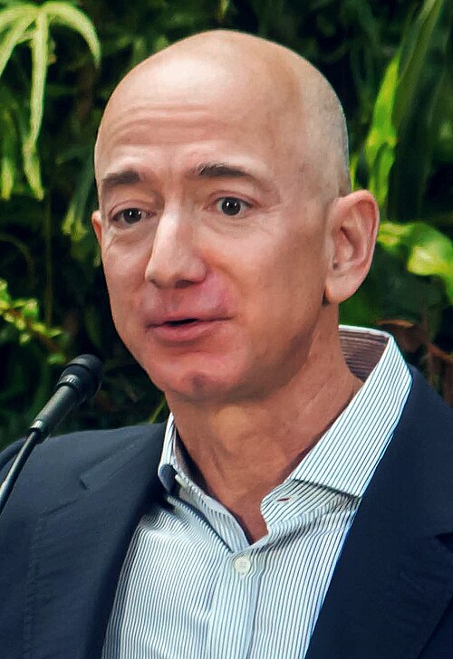 Jeff Bezos Using Computer Digital Feudalism: How Tech Billionaires Own Everything You Use